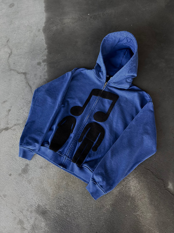 
    
      “Music Connects Us” Zip-Up (Blue)
    
