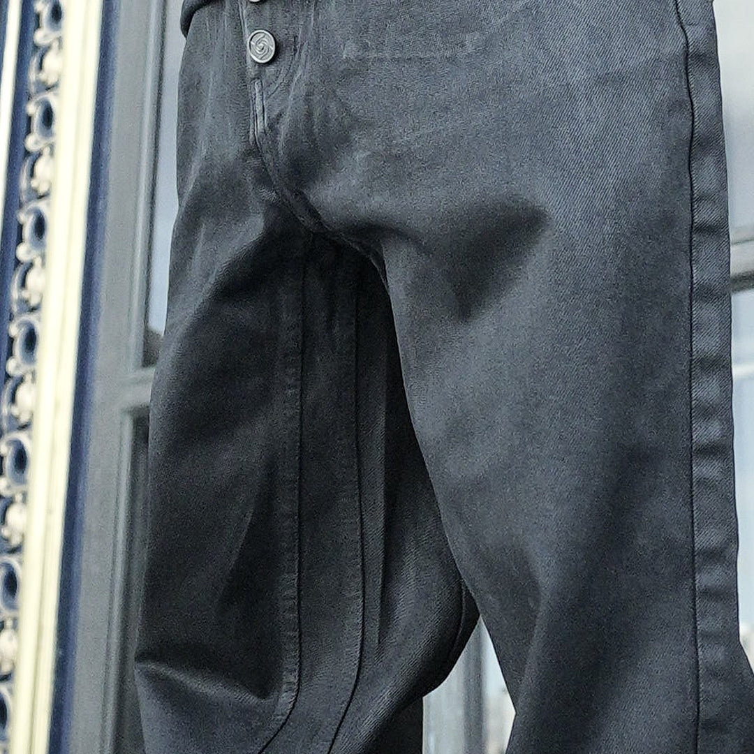 Shibuya Wax Jeans, close-up: coated texture
