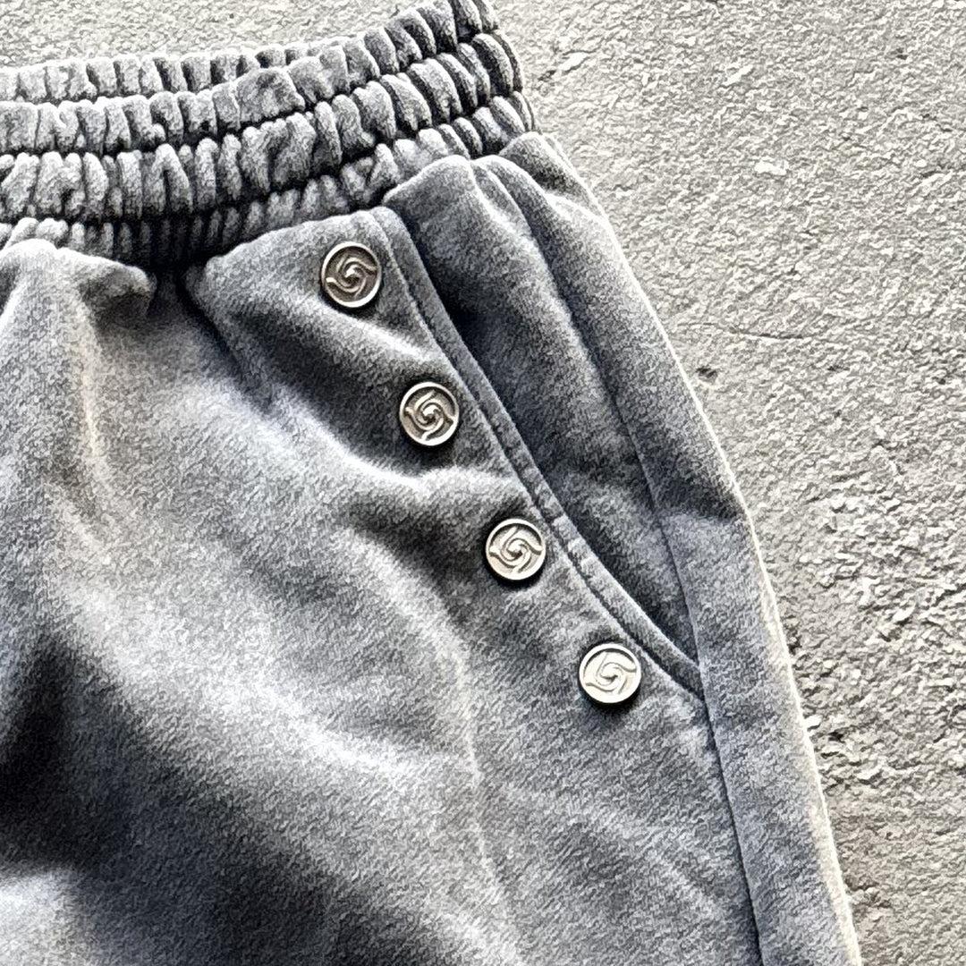 Tobari Sweats (Stone), close-up: hip buttons